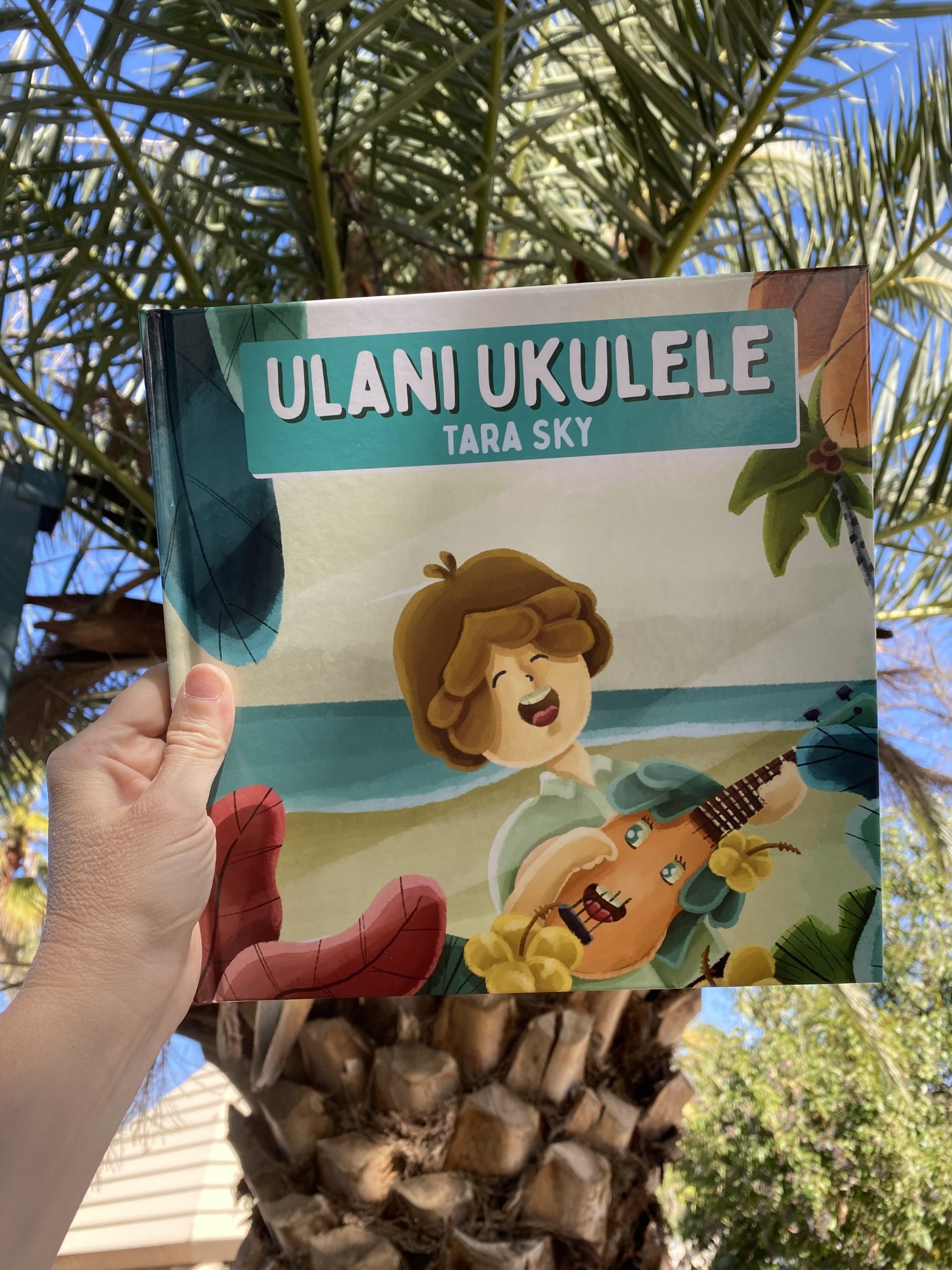 Ulani cover in palm trees.